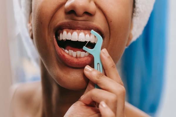 how to floss teeth hawthorn